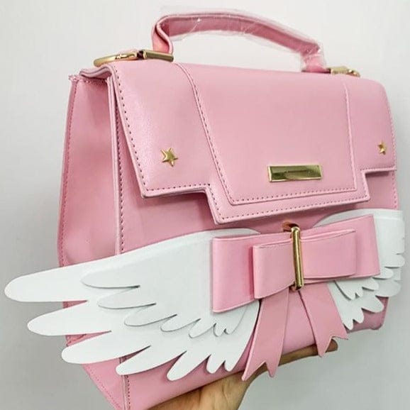 Sac à Main Rose Pâle à Ailes Blanches et Nœud Doré – Image 2