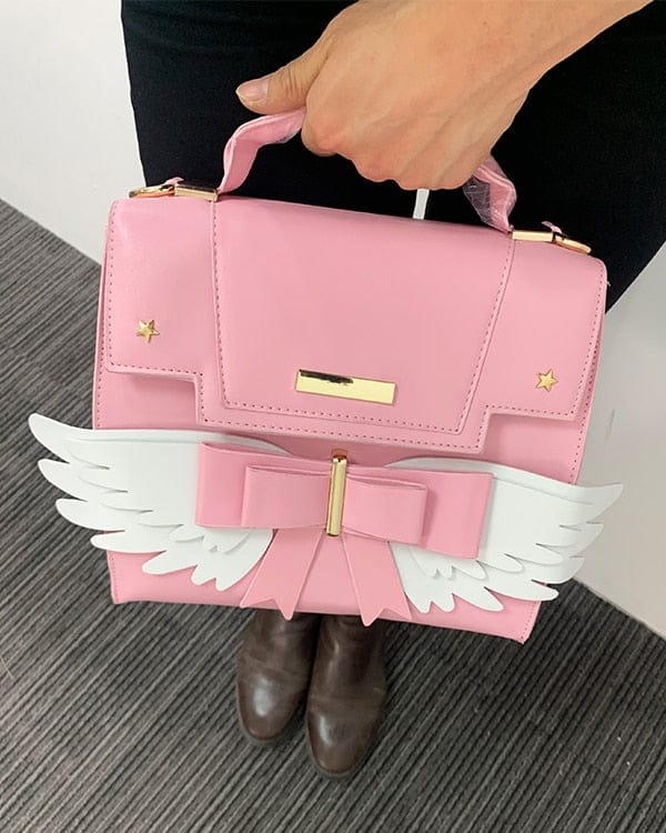 Sac à Main Rose Pâle à Ailes Blanches et Nœud Doré – Image 11