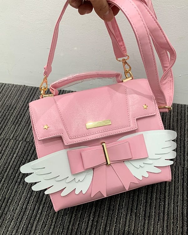 Sac à Main Rose Pâle à Ailes Blanches et Nœud Doré – Image 4