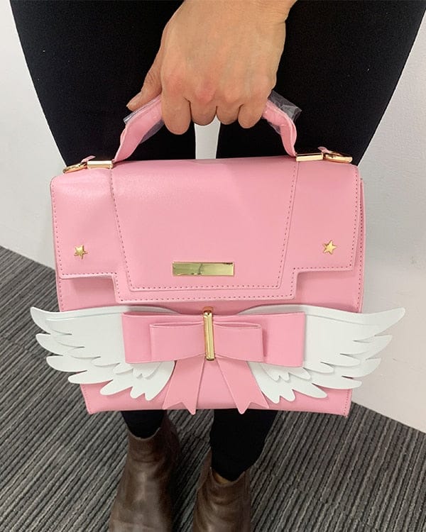 Sac à Main Rose Pâle à Ailes Blanches et Nœud Doré – Image 5