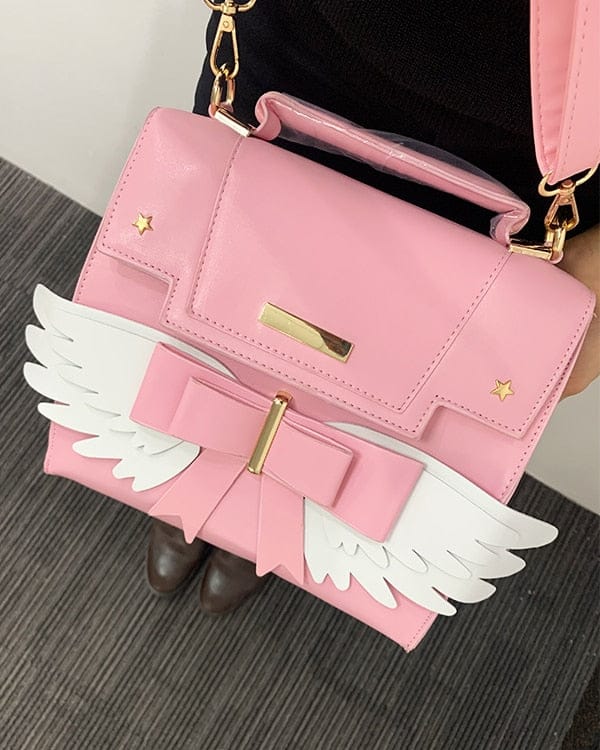 Sac à Main Rose Pâle à Ailes Blanches et Nœud Doré – Image 6