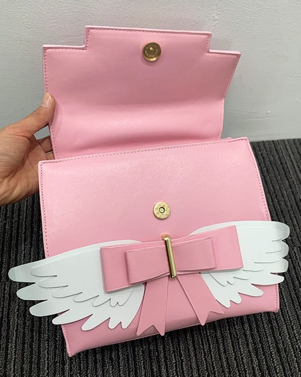 Sac à Main Rose Pâle à Ailes Blanches et Nœud Doré – Image 7