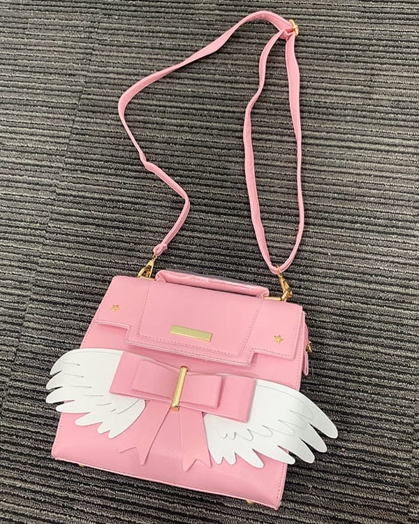 Sac à Main Rose Pâle à Ailes Blanches et Nœud Doré – Image 8