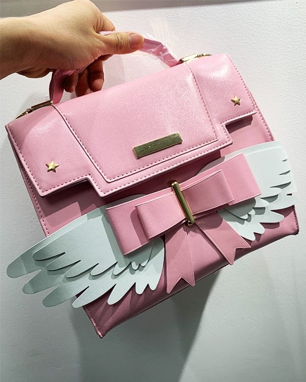 Sac à Main Rose Pâle à Ailes Blanches et Nœud Doré – Image 9