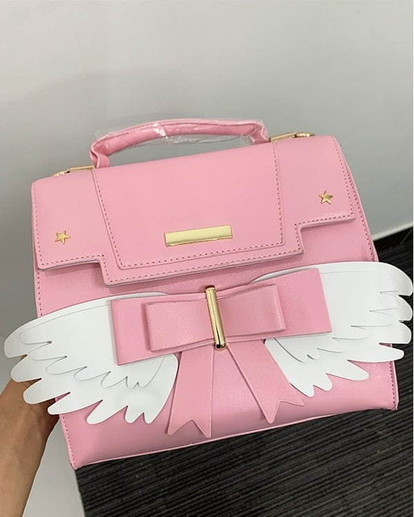 Sac à Main Rose Pâle à Ailes Blanches et Nœud Doré – Image 10